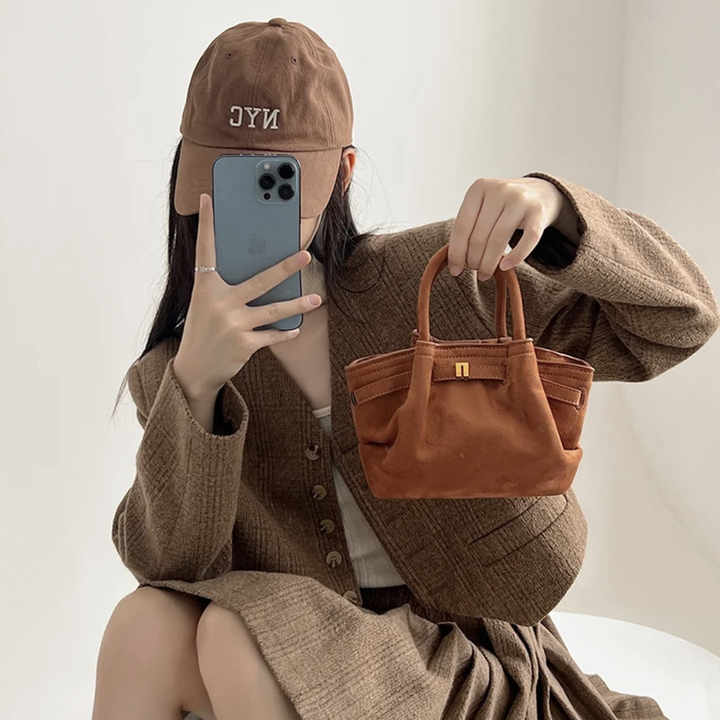 حقيبة يد نسائية من الجلد المدبوغ