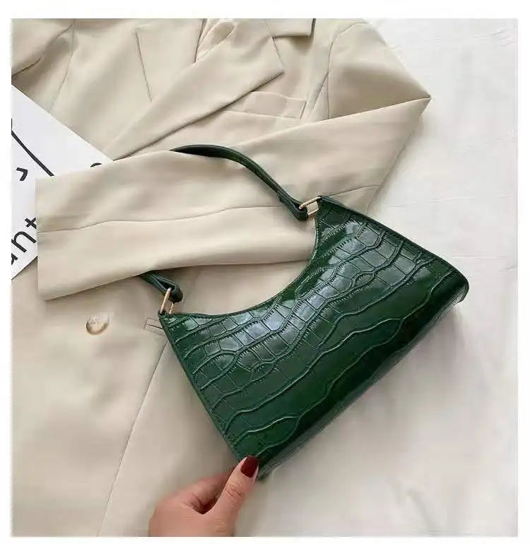 Fashionable women's crocodile leather handbag