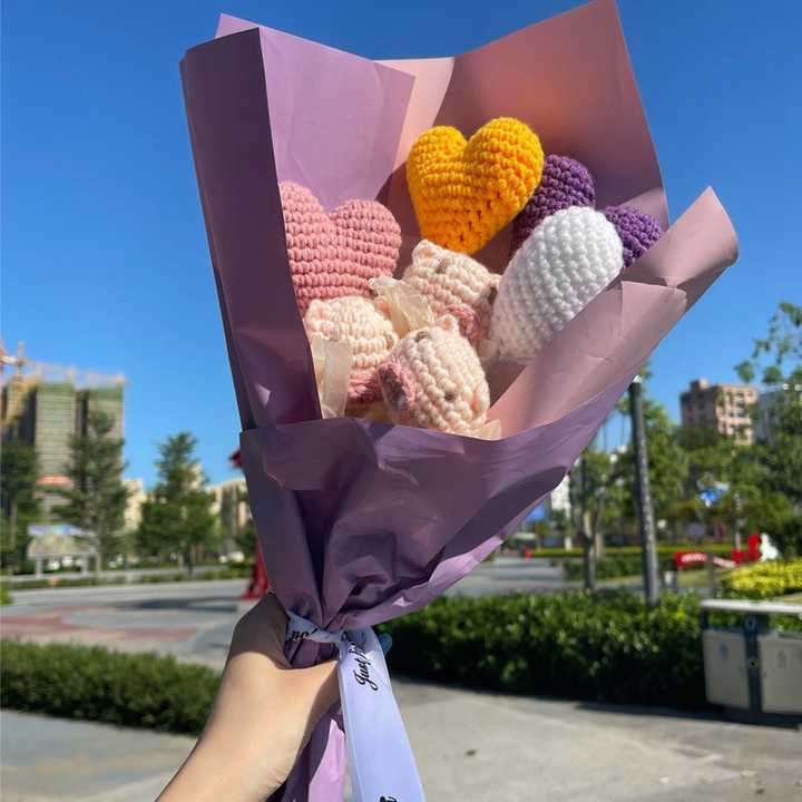 Hand-embroidered heart-shaped flowers