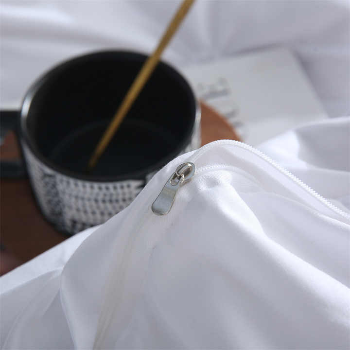 Luxury light bedding set, floral embroidery technique.