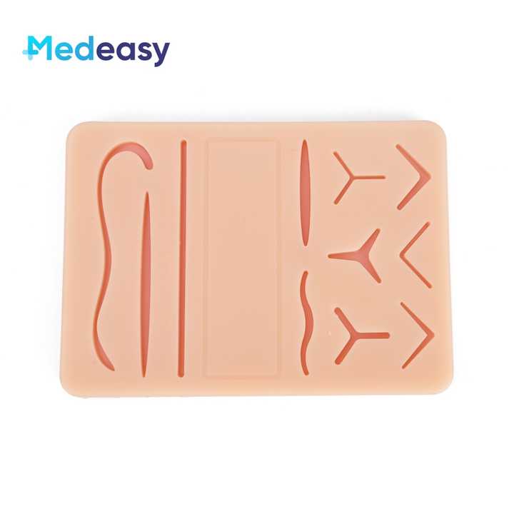 Suture with 11 pre-cut wounds and mesh under first aid