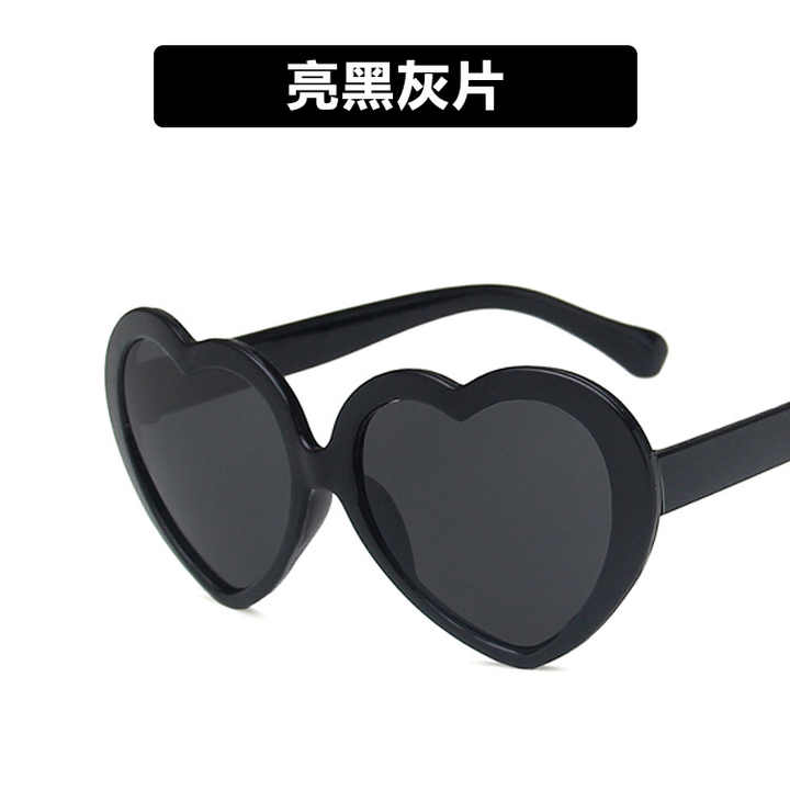 Pink heart-shaped sunglasses for children