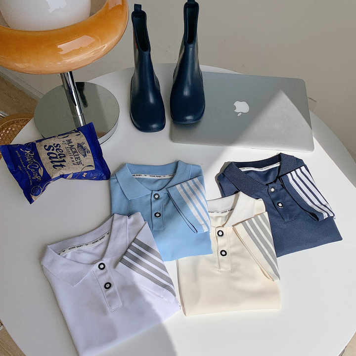 قميص أطفال صيفي جديد بأكمام قصيرة . New Summer Children's Short