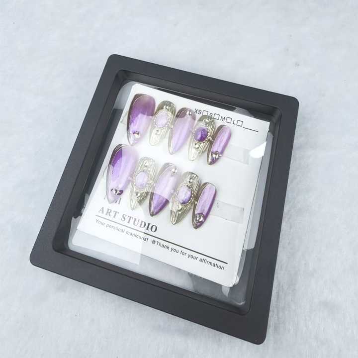 Handmade almond-shaped nails in purple