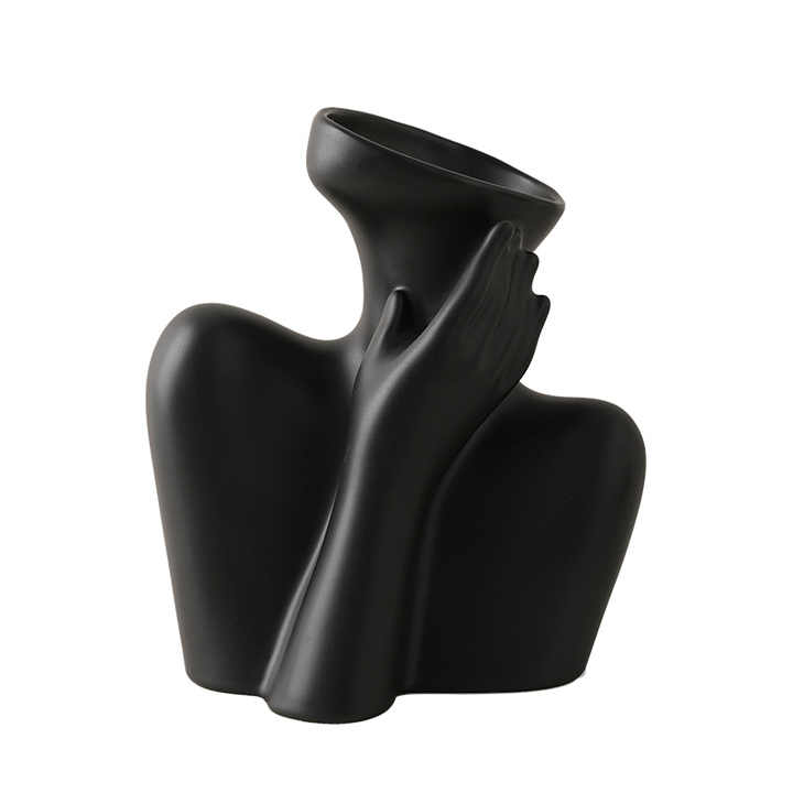 Modern and simple colorful ceramic vase of morandi, flower arrangement in a Nordic home vase setting arrangement