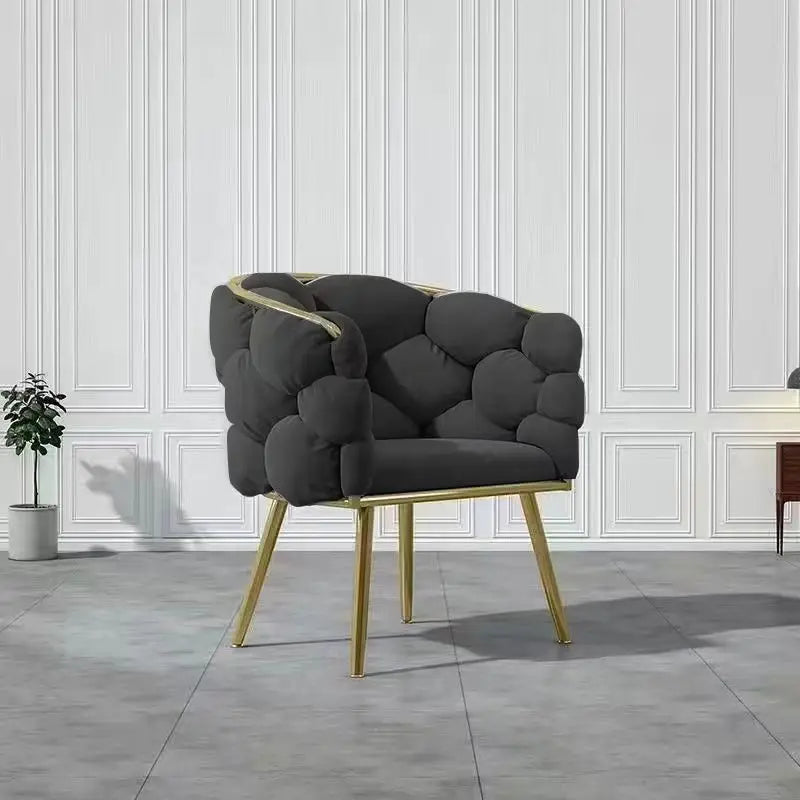Velvet chair with golden legs