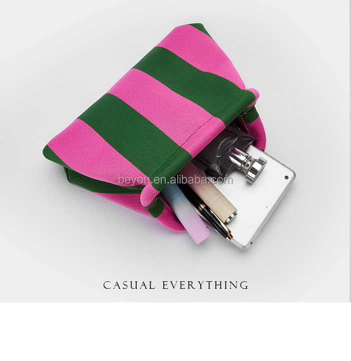 Elegant pink and green striped clutch bag for women