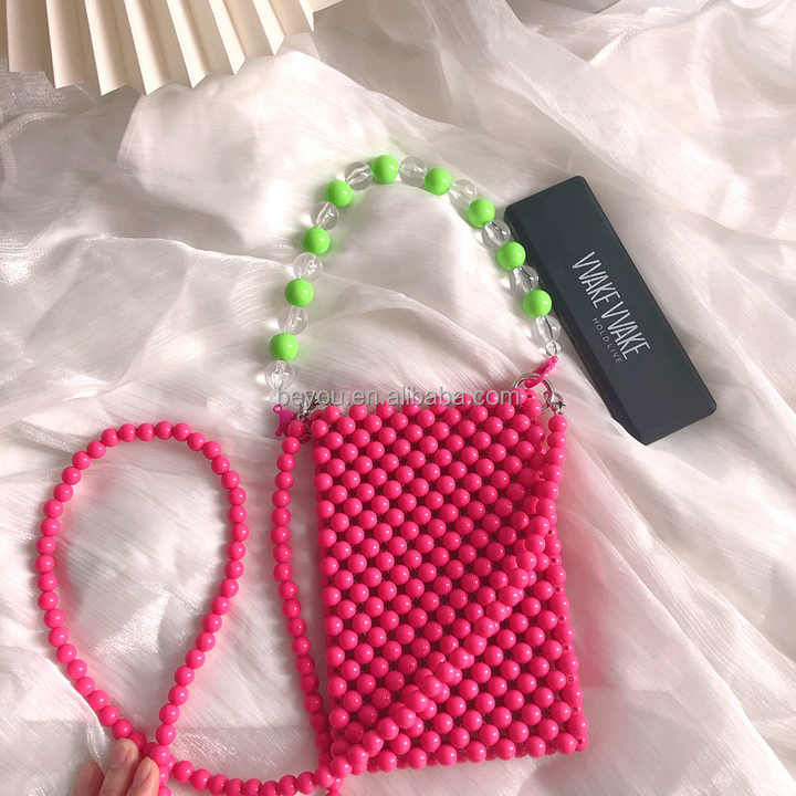 New women's handbag in hot pink and green