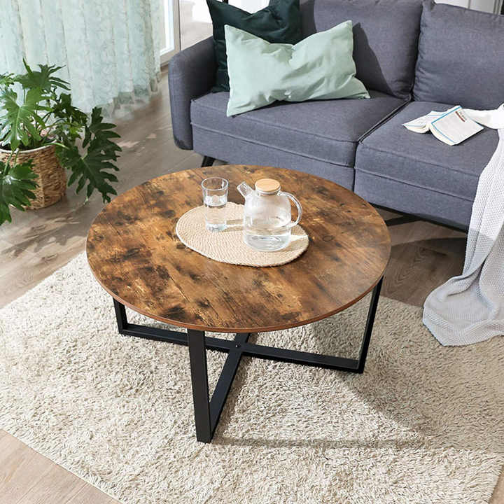 Classic antique coffee table with metal frame design. 
