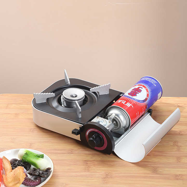 موقد غاز صغير محمول للتخييم والسفر مزود بهيكل . Portable Mini Gas Stove for Camping and