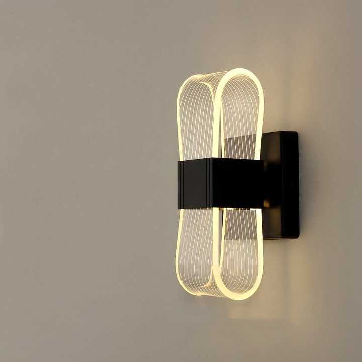 Simple modern wall lamp next to 