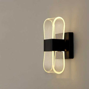 Simple modern wall lamp next to 