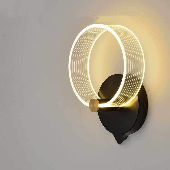Simple modern wall lamp next to 