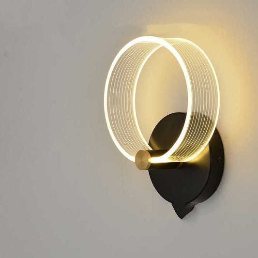 Simple modern wall lamp next to . 