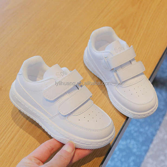 White children's shoes for spring. 