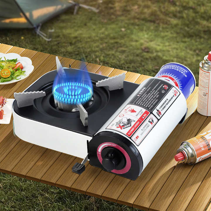 موقد غاز صغير محمول للتخييم والسفر مزود بهيكل . Portable Mini Gas Stove for Camping and
