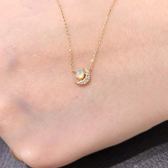 Very small gold plated opal pendant