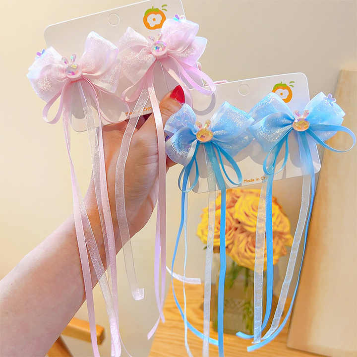 شبك شعر على شكل شريط فيونيكة- Bowknot Hair Clip