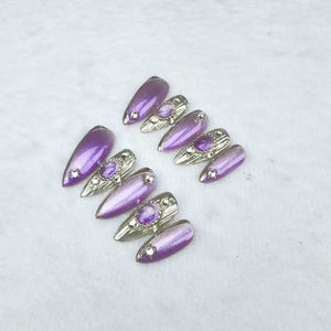 Handmade almond-shaped nails in purple 