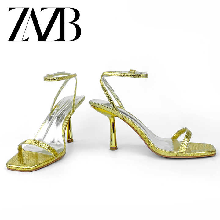 Luxury gold leather high heel shoes 