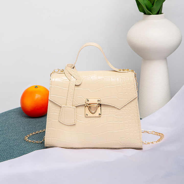 New faux crocodile leather handbag