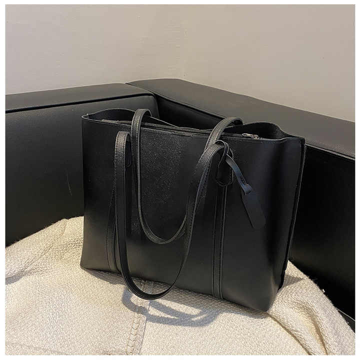 Women's wide leather bag