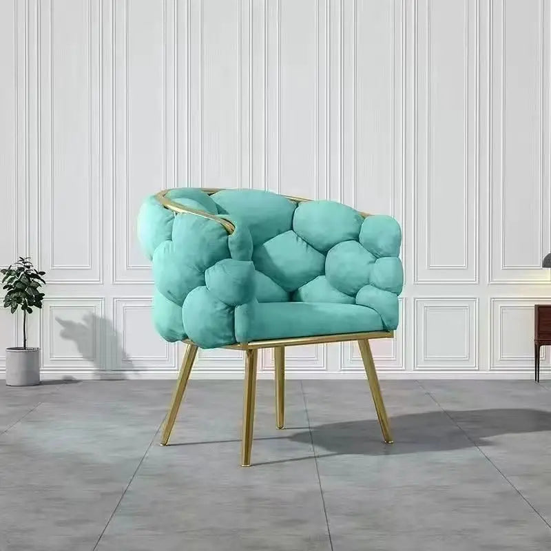 Velvet chair with golden legs