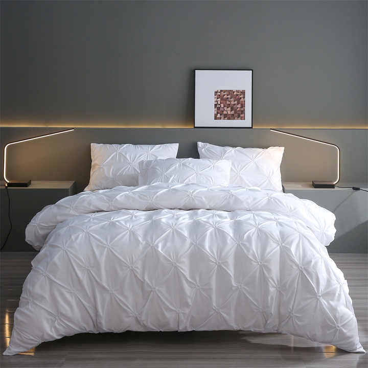 Luxury light bedding set, floral embroidery technique. 