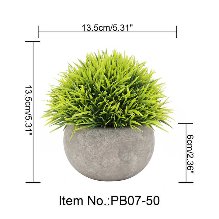 Small artificial plants in plastic pots. 