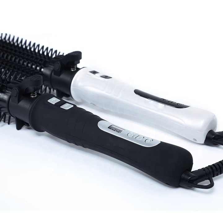 مكواة شعر بجهد مزدوج مع فرشاة شعر قابلة . Dual Voltage Hair Straightener with
