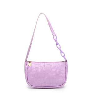 Elegant women's handbags made of PU leather with snakeskin print