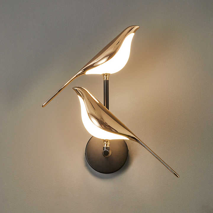 مصباح حائط على شكل طائر