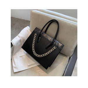 حقائب يد نسائية أنيقة من جلد البولي يوريثان بتصميم جلد التمساح