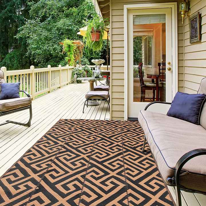 Plastic straw mat for outdoor activities. 