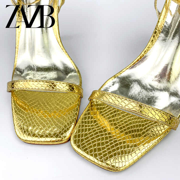 Luxury gold leather high heel shoes 